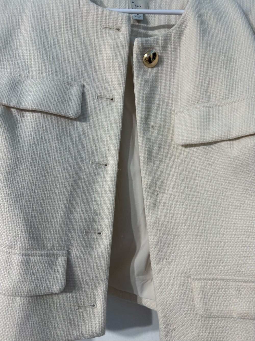 Cream Textured Collarless Jacket with Gold Accent - Picture 2 of 3